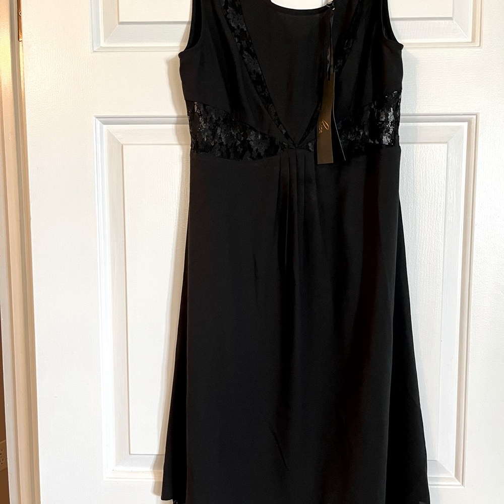 C. Luce. Black dress with lace detail. Size small.